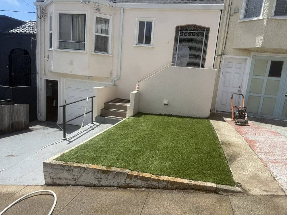 After: front yard with new artificial turf